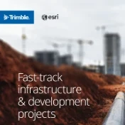 An aerial image of a construction site and road is overlaid with a blue, web-like digital network pattern.