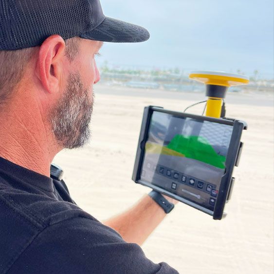 Jason using SiteVision to see the track design in the physical location