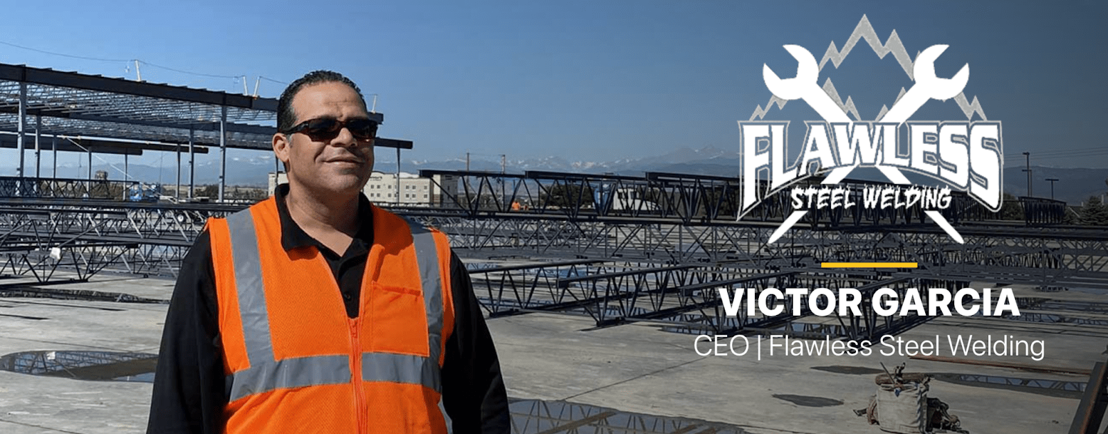 Victor Garcia, CEO of Flawless Steel Welding, stands on a construction site.