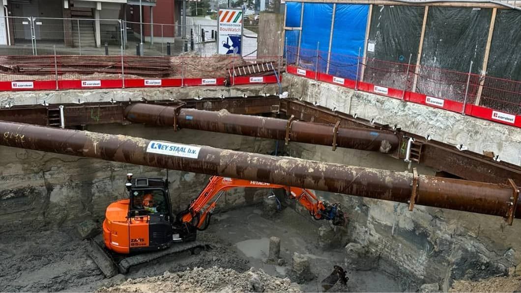 Civil contractor using construction technology on a machine in the field with a text overlay indicating this is the third art