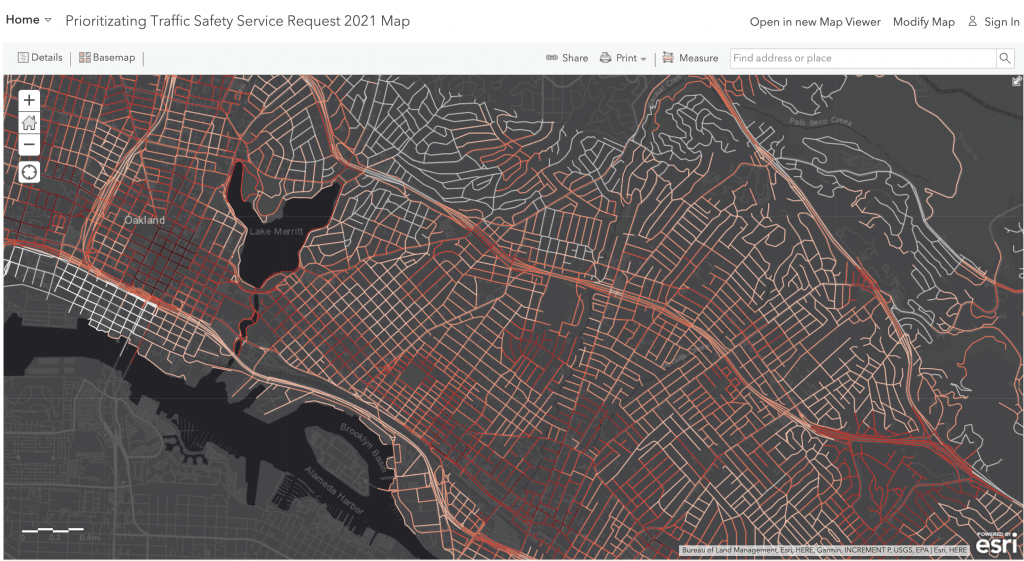 Map showing traffic safety prioritization in Oakland, CA, with streets color-coded by safety score.