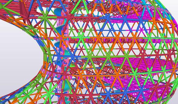 A 3D model of a complex geodesic dome structure made of multi-colored steel beams.