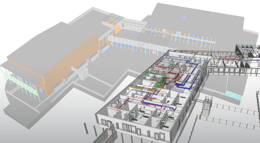 3D model of a building's HVAC system, showing intricate ductwork and piping within a cutaway view of the structure.