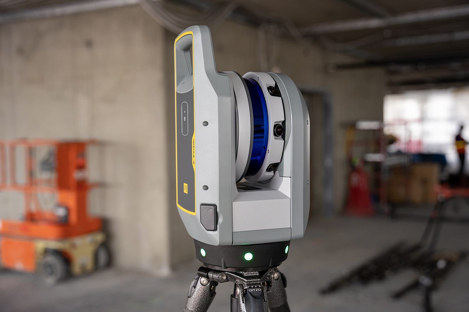 3D laser scanner on a tripod on a construction site.