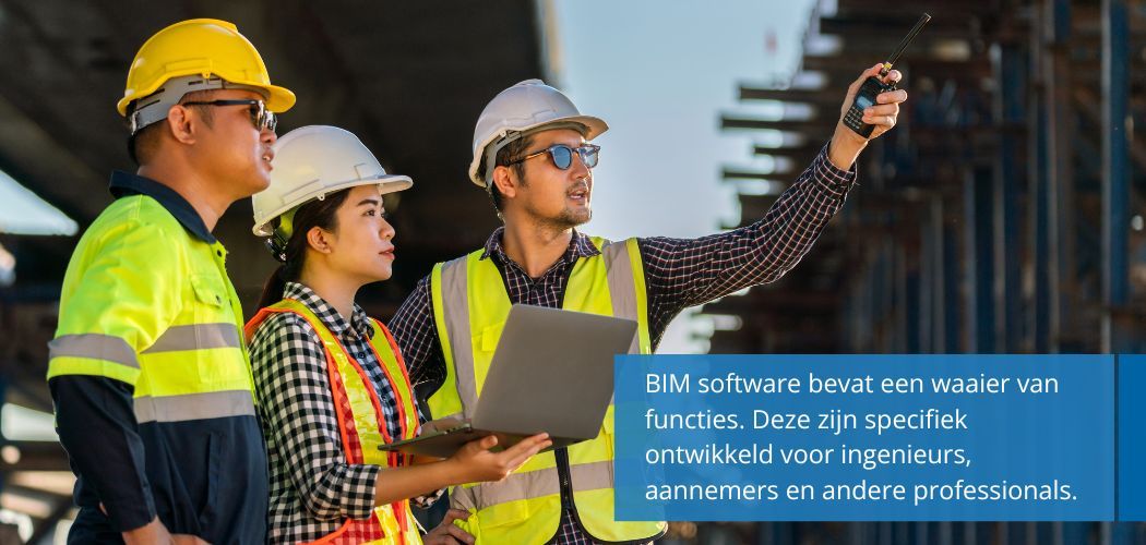 A diverse team of construction professionals, wearing hard hats and high-visibility vests, review plans on a laptop at a construction site.