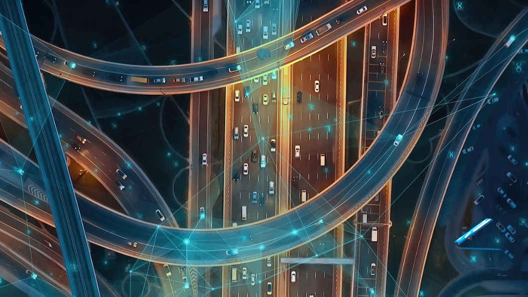 Autonomous cars navigate a complex highway cloverleaf with the help of satellite-based precise positioning.