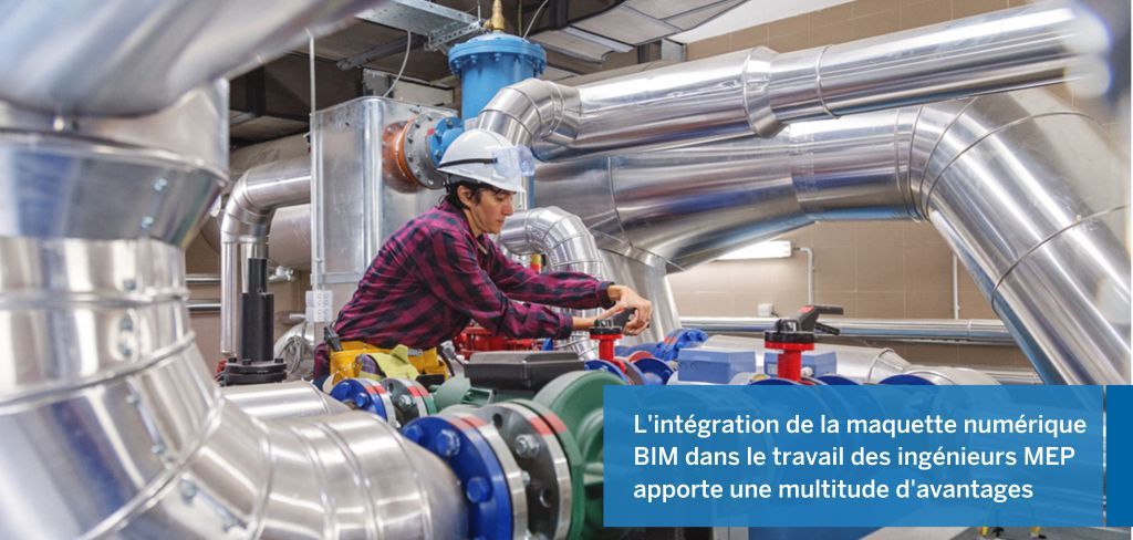 A technician wearing a hard hat and safety vest works on large industrial pipes and valves in a mechanical room.
