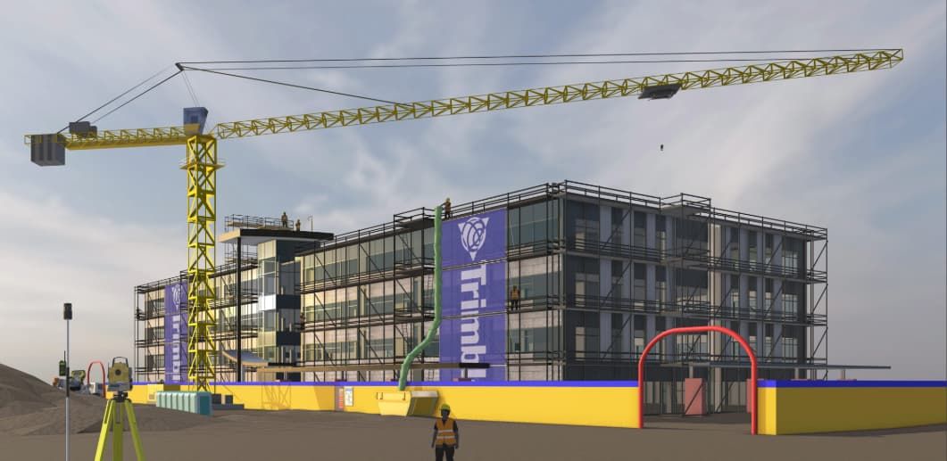 Image SketchUp d’un modèle Revit importé montrant l’extérieur d’un bâtiment commercial en construction avec une grande grue j