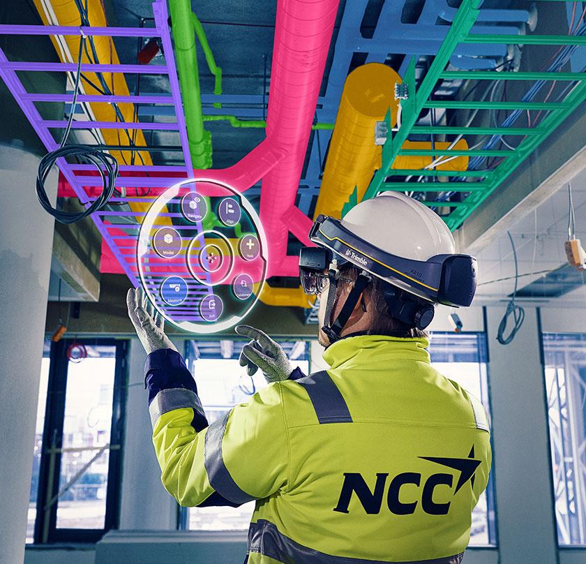 Man using mixed reality on a construction site