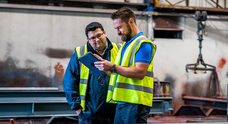 Chris Gatehouse and Matt Hastwell using Tekla PowerFab in the fabrication workshop at Wareing Buildings