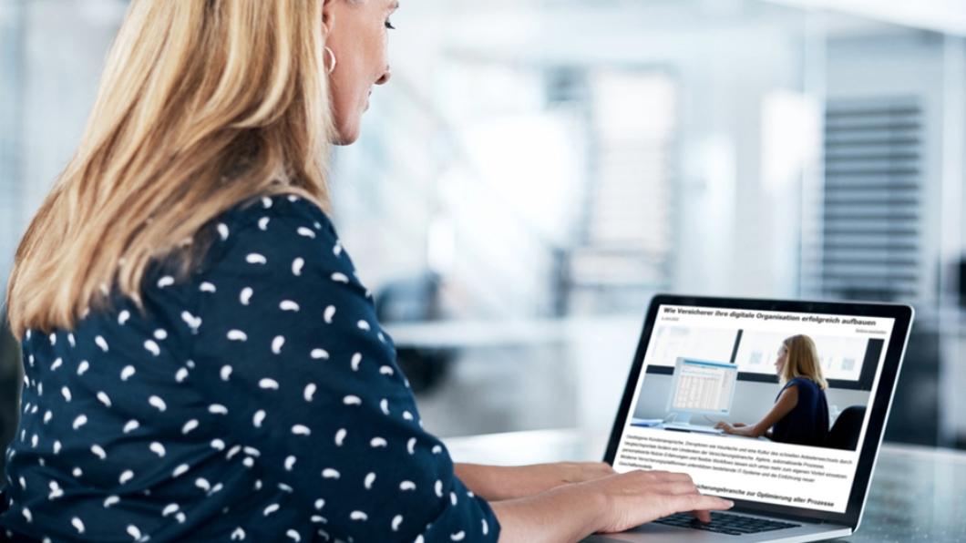 An employee using Viewpoint Analytics in the office