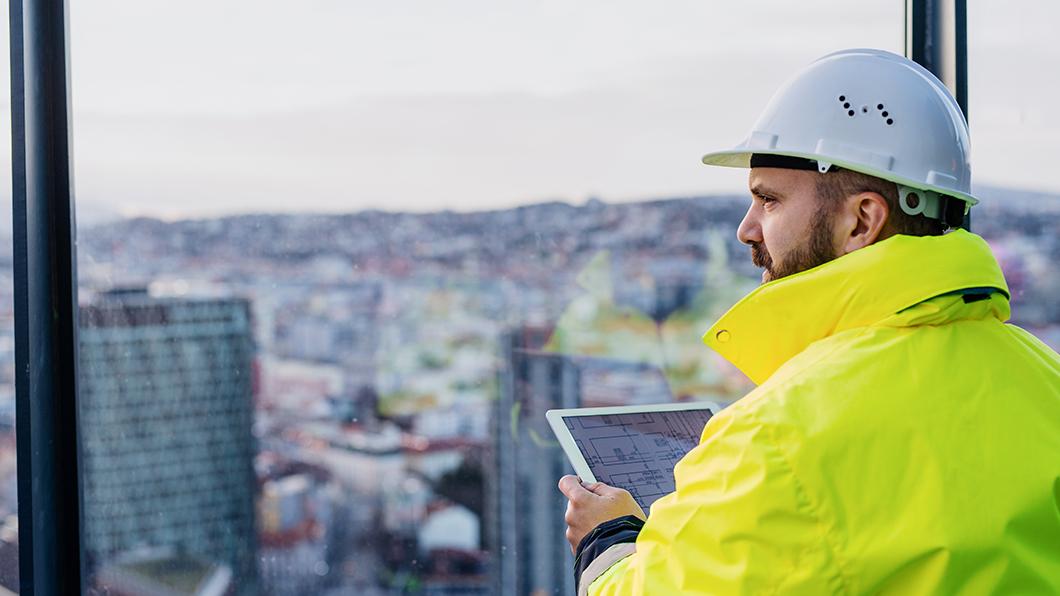 blog-project-delivery-cmar-tablet-blueprints-1060x596