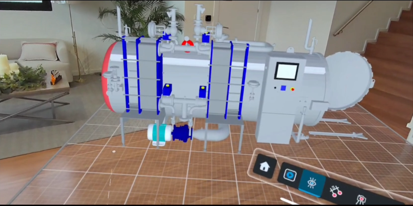 SketchUp augmented reality shows a piece of machinery being projected with an office space in the background.