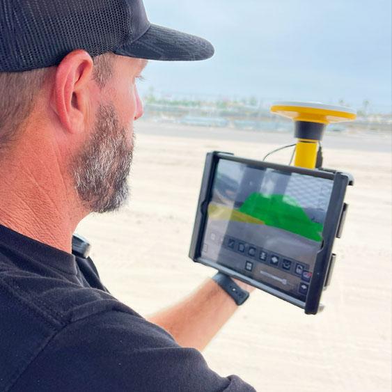 Jason using SiteVision to see the track design in the physical location