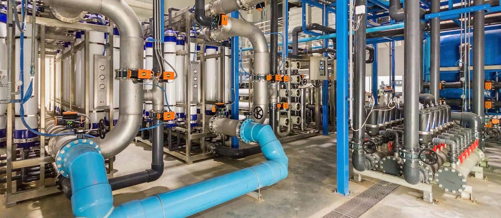 Water treatment plant with large pipes and filtration units